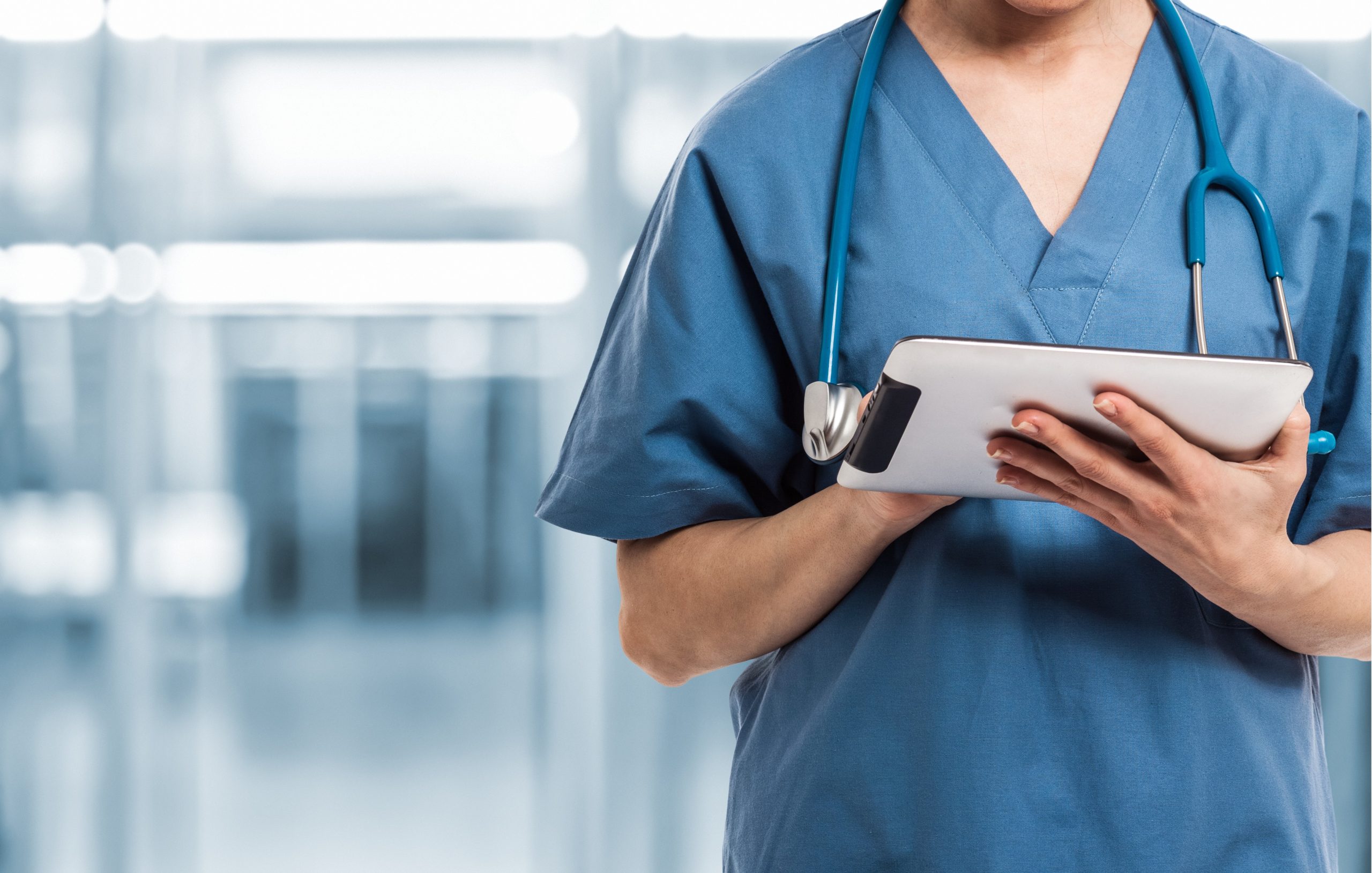 Healthcare And Medicine. Doctor using a digital tablet